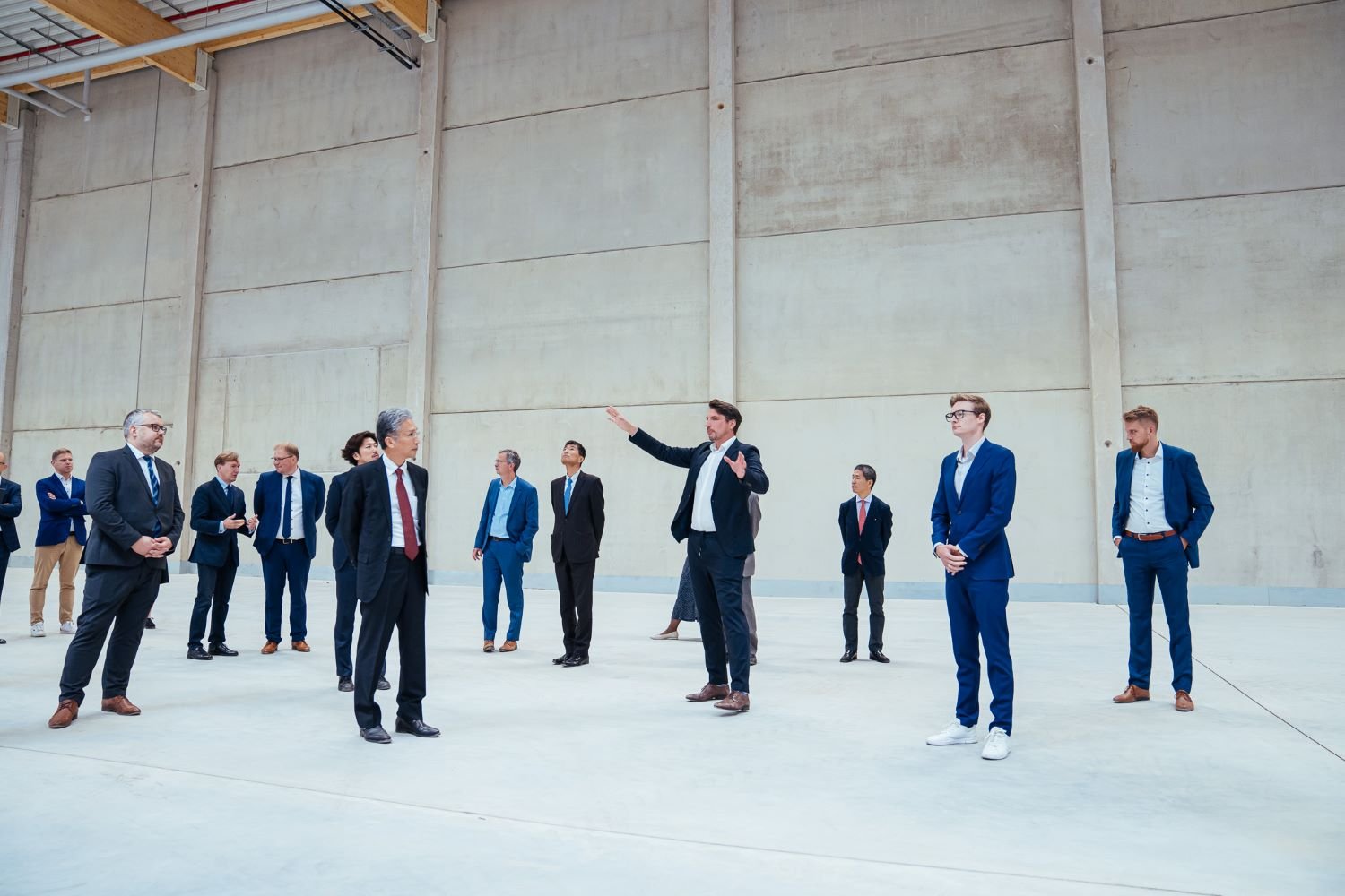 Dr Linus Froböse giving the factory building tour.